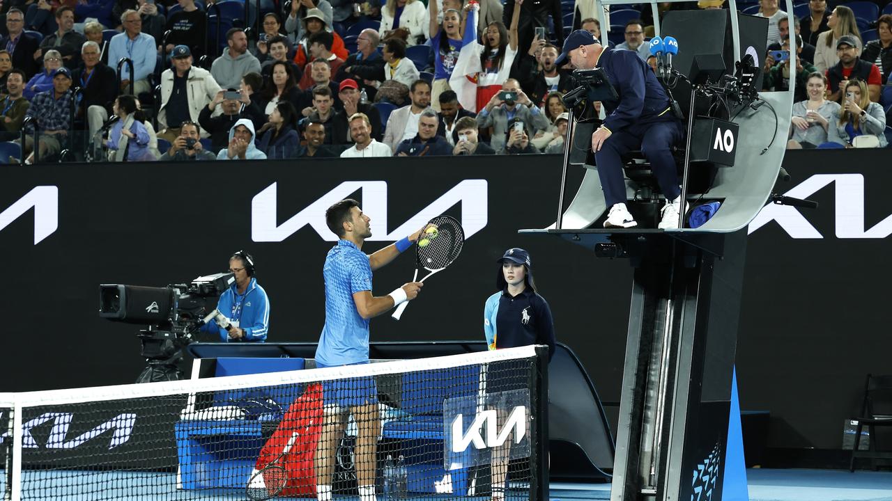 Novak Djokovic talking to chair umpire Fergus Murphy. Picture: Getty Images