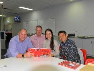 WELCOME TO BUNDY: NewsMail Editor Adam Wratten, Councillor Scott Rowleson and Mr Zhu with his daughter Julia visiting Bundaberg from Nanning. Picture: Geordi Offord