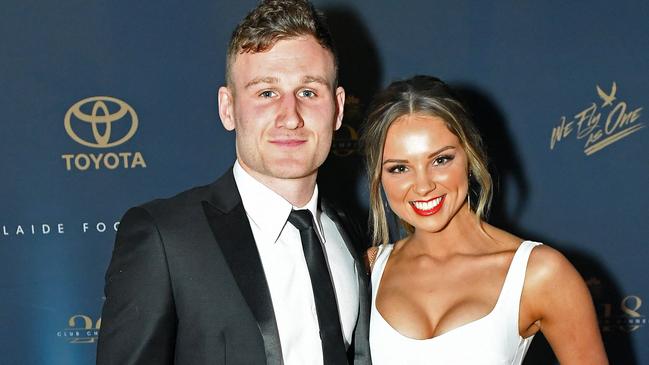 31/08/18 - Rory Laird and Lucy McArthur on the red carpet at the Adelaide Crows Club Champion Awards at the Adelaide Entertainment Centre.