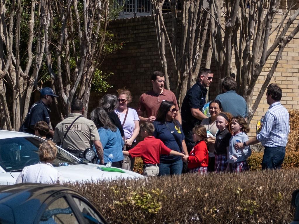 Children at Woodmont Baptist Church after being ferried to safety by buses from the scene of the shooting. Picture: Seth Herald/Getty Images/AFP