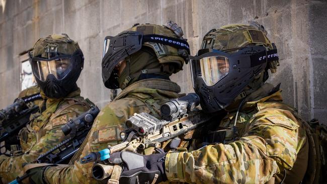 Australian army soldiers from the 3rd Battalion, Royal Australian Regiment, provide security outside a building during the conduct of an urban assault serial using the Blue Bolt non-lethal training ammunition, as part of the 2022 Duke of Gloucester Cup in Singleton. *** Local Caption *** Australian Army infantry soldiers from across Australia tested their core skills for the prestigious Duke of Gloucester Cup at the School of Infantry, near Singleton in NSW, July 31 - August 5 2022. The Duke of Gloucester Cup is the Armyâ€™s premier military skills competition, pitting the best Royal Australian Corps of Infantry rifle sections from each unit against one another through a series of challenging activities that test their core infantry skills, including marksmanship, tactics, teamwork and fitness. Along with the Duke of Gloucester Cup, five other trophies are awarded: Sir Arthur MacDonald Trophy for best foundation war-fighting skills; Gurkha Trophy for best live-fire shooting; Royal Ulster Rifles Trophy for best falling plate shooting; OSCMAR Trophy for best battle endurance; and the DSM Roche CSC Memorial Cup for best individual soldier. The Duke of Gloucester Cup was created by Prince Henry, Duke of Gloucester, in 1946, while serving as the Governor-General of Australia.