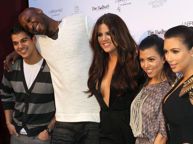 Rob Kardashian, Lamar Odom, Khloe Kardashian Odom, Kourtney Kardashian and Kim Kardashian pose for photographers. Picture: Getty.