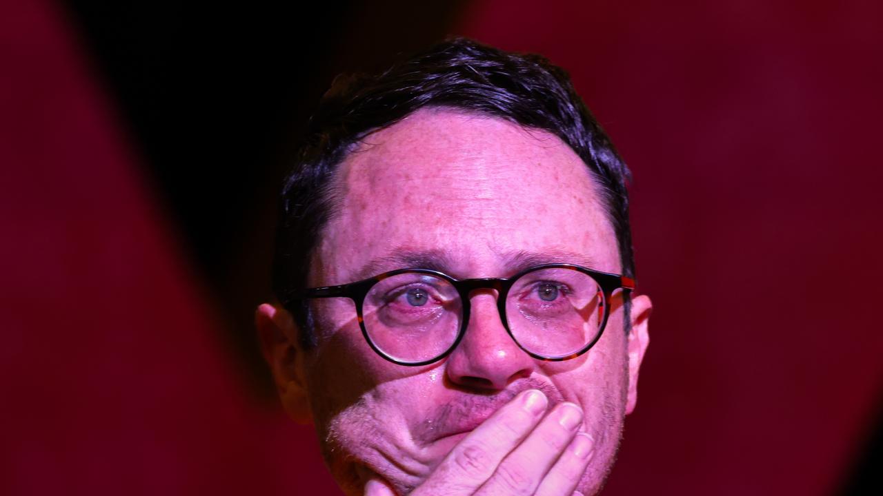 A man reacts during a live telecast by Australia's Prime Minister Anthony Albanese after the result of the referendum became clear. Picture: Getty Images