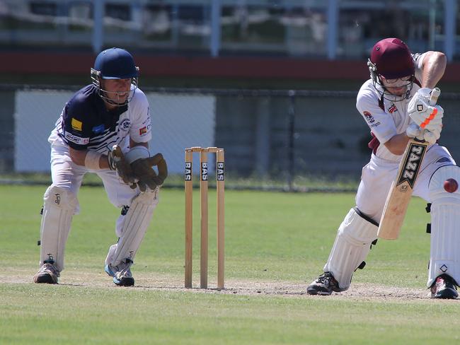 Steven Baker (left) behind the stumps for Broadbeach Robina against Burleigh last season. Picture: Mike Batterham