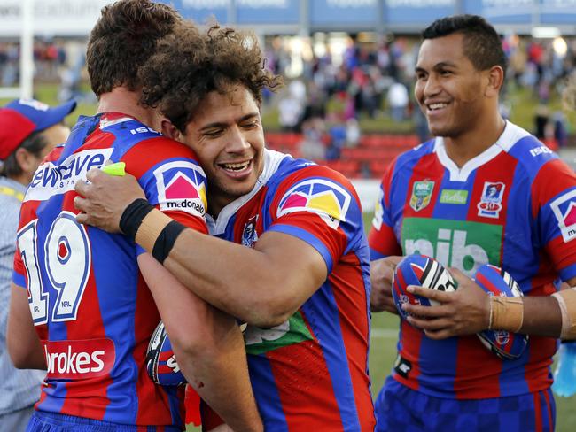 Dane Gagai of the Knights celebrates the win with Samuel Stone after the Round 22 NRL match between the Newcastle Knights and the New Zealand Warriors at McDonald Jones Stadium in Newcastle, Saturday, August 5, 2017. (AAP Image/Darren Pateman) NO ARCHIVING, EDITORIAL USE ONLY