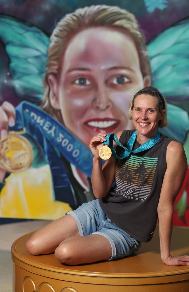 Nova's breakfast show commissioned a street art portrait of Susie O'Neill to commemorate the 20th anniversary of her gold medal win at the Sydney Olympics. She is sitting on the original podium from 2000. Picture: Peter Wallis