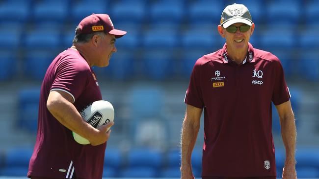 Queensland coach Wayne Bennett (right) with Mal Meninga, doesn’t expect Tino Fa’asuamaleaui to back down against Payne Haas. Picture: Chris Hyde/Getty Images