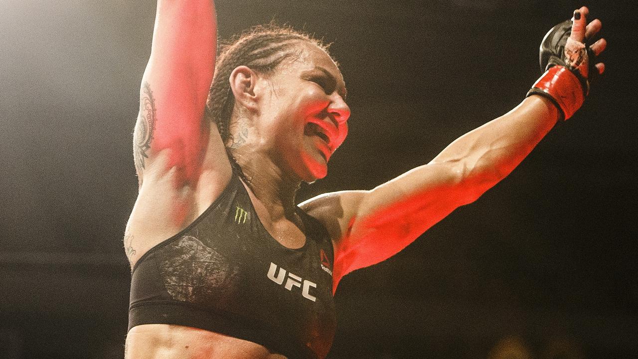 Cris Cyborg celebrates the win over Felicia Spencer at UFC 240. (Jason Franson/The Canadian Press via AP)