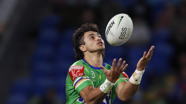 GOLD COAST, AUSTRALIA - JULY 17:  Xavier Savage of the Raiders takes a high ball during the round 18 NRL match between the Canberra Raiders and the Cronulla Sharks at Cbus Super Stadium, on July 17, 2021, in Gold Coast, Australia. (Photo by Regi Varghese/Getty Images)