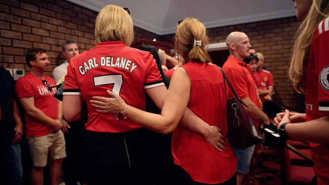 More than 300 mourners gathered to farewell Inpex worker Carl Delaney at his funeral in Darwin in 2017.