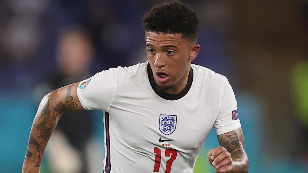 ROME, ITALY - JULY 03: Jadon Sancho of England runs with the ball during the UEFA Euro 2020 Championship Quarter-final match between Ukraine and England at Olimpico Stadium on July 03, 2021 in Rome, Italy. (Photo by Lars Baron/Getty Images)
