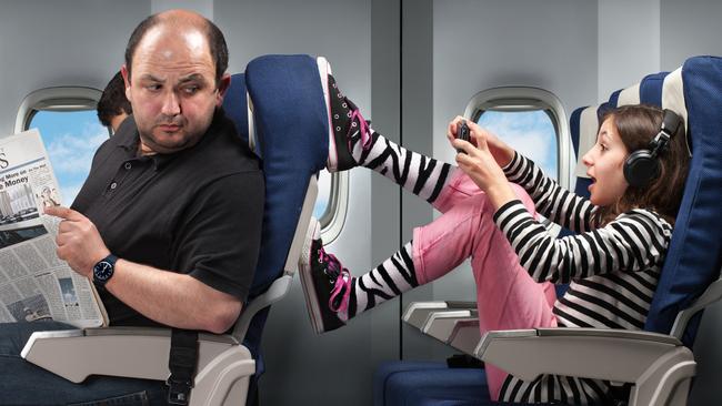 55 per cent of Aussies think having your chair kicked is the most frustrating thing on a plane trip. Picture: iStock