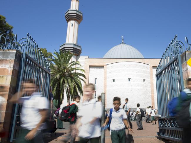 NO BYLINE - General photographs of students leaving Malek Fahd Islamic School on Waterloo Road in Greenacre NSW Australia - Government is discussing whether to remove funding from the school or not after funds have been misused.