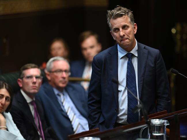 NSW Minister for Transport and Roads Andrew Constance speaks during a NSW Bushfires condolences motion in the Legislative Assembly at New South Wales Parliament House in Sydney, Tuesday, February 4, 2020. (AAP Image/Joel Carrett) NO ARCHIVING