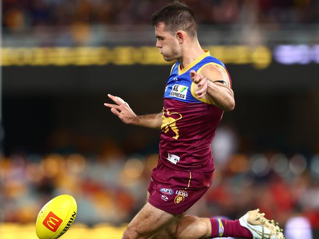 BRISBANE, AUSTRALIA – JULY 23: Brandon Starcevich of the Lions kicks during the round 19 AFL match between the Brisbane Lions and the Gold Coast Suns at The Gabba on July 23, 2022 in Brisbane, Australia. (Photo by Chris Hyde/AFL Photos/Getty Images)