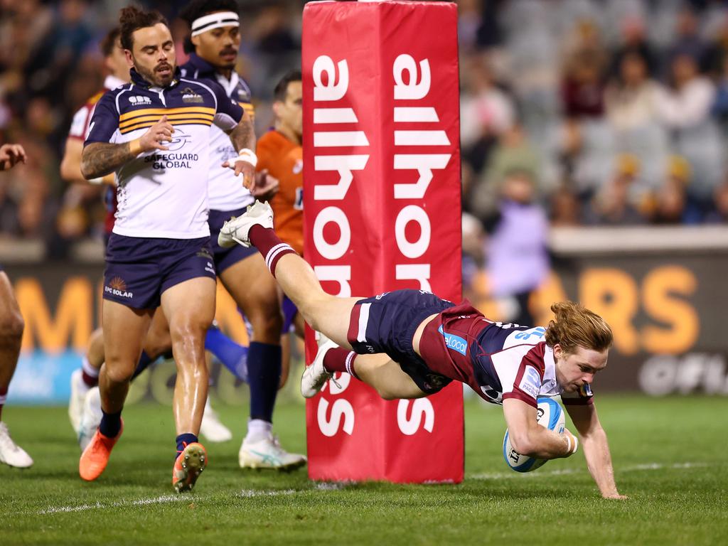 Tim Ryan scores a try for the Reds. Picture: Getty Images