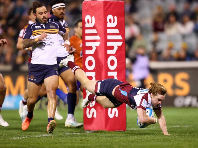 Tim Ryan scores a try for the Reds. Picture: Getty Images