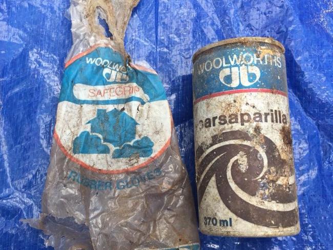 The Woolworths plastic bag and drink can believed to be at least 32 years old.