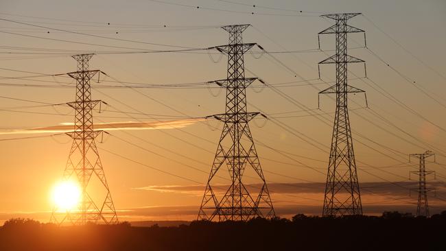 Transmission towers near Torrens Island power station. Picture Dean Martin