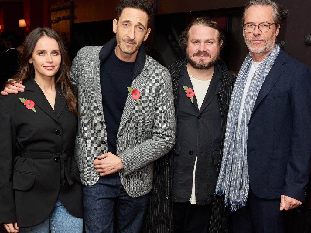 Felicity Jones with Adrien Brody, Brady Corbet and Guy Pearce at a special BAFTAs screening of The Brutalist.