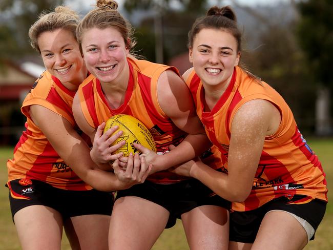 Courtney Cramey, Kellie Gibson and Ebony Marinoff hope to impress ahead of the inaugural women’s AFL next year. Picture: Calum Robertson