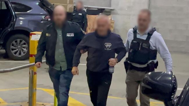 Two Russian-born Australian citizens accused of obtaining Australian Defence Force material to share with Russian authorities will face Brisbane Magistrates Court today after being charged with an espionage-related offence. Picture: Australian Federal Police