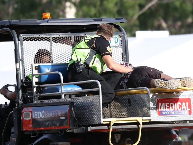 Medical crews treating a reveller at the FOMO Music Festival earlier this year. Picture: David Swift.