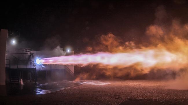 This photo made available by SpaceX shows a test firing of the company's Raptor engine in McGregor, Texas.