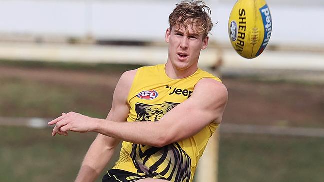 Richmond training at Broadbeach Football Club on the Gold Coast. . 10/07/2020.   Tom Lynch of the Tigers wears a glove on his injured right hand at training today  . Pic: Michael Klein