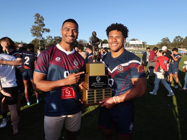 NRL Crunulla player Ronaldo Mulitalo with Ipswich SHS player Josiah Pahulu. Picture: NIGEL HALLETT