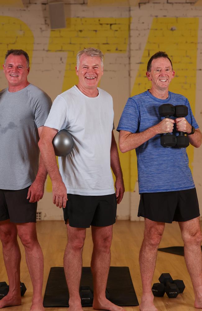 Darren Anstee, Tony Dow and Rick Wight love doing pilates at Upstate studio in Ascot Vale. Picture: Jason Edwards