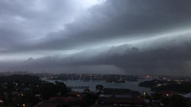 A thunderstorm rolled across Sydney causing blackouts, flooding and heavy winds. Picture: Margot Lloyd