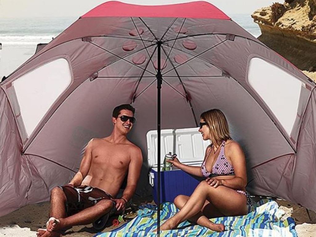 This genius beach umbrella transforms into a canopy.