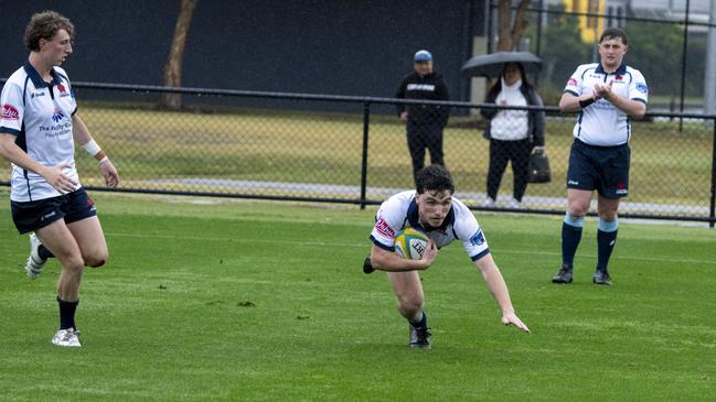 Joe Harvey scores for NSW Juniors at the Australian Schools Rugby Championship. Picture: Anthony Edgar