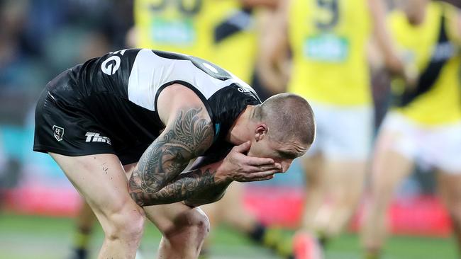 Port Adelaide's Hamish Hartlett hangs his head after the final siren. Picture: Sarah Reed