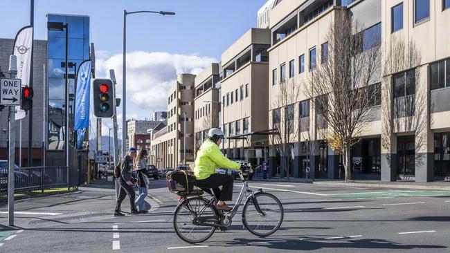 Cyclist on the intersection of Collins and Barrack streets. Picture: Caroline Tan