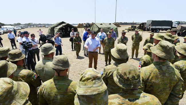 Prime Minister Scott Morrison visits the Defence Staging Ground at Kingscote Aiport on Kangaroo Island. Picture: David Mariuz/AAP