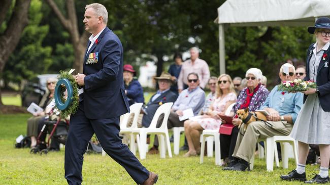 Toowoomba RSL Sub Branch president Scott May lays the official wreath at the Service of Dedication for World War I unmarked graves at the Drayton and Toowoomba Cemetery, Sunday, November 7, 2021. Picture: Kevin Farmer