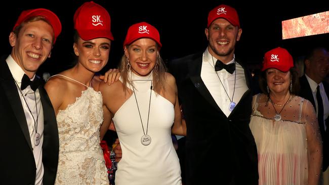 Gina Rinehart, far right, at Royal Flying Doctor Service Wings For Life 90th Birthday Ball at Adelaide Entertainment Centre with swimmer Travis Mahoney, left, beach volleyballer Phoebe Bell, and swimmers Madison Wilson and Kyle Chalmers. Picture: Supplied