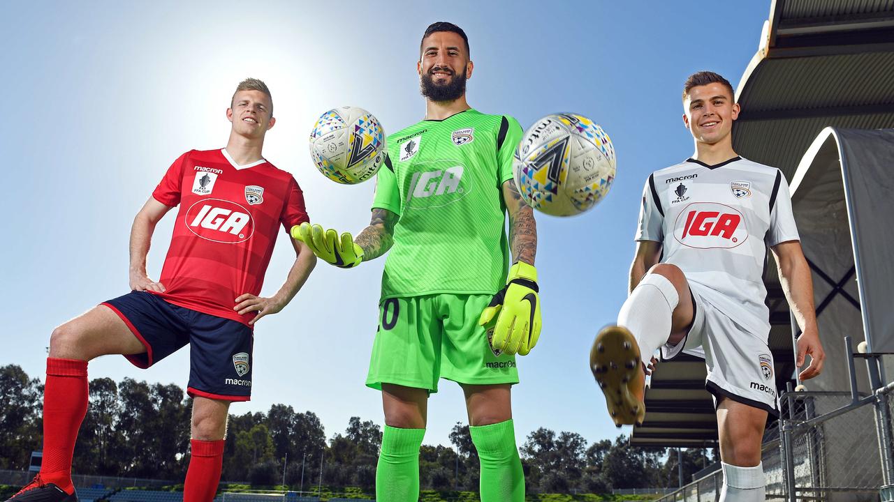 Jordan Elsey, Paul Izzo and Nathan Konstandopoulos in the Reds FFA Cup kit ahead of round of 32 game against Central Coast Mariners.