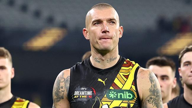 MELBOURNE, AUSTRALIA - MAY 25: Dustin Martin of the Tigers and his Tigers team mates look dejected after losing the round 11 AFL match between Richmond Tigers and Essendon Bombers at Melbourne Cricket Ground, on May 25, 2024, in Melbourne, Australia. (Photo by Quinn Rooney/Getty Images)