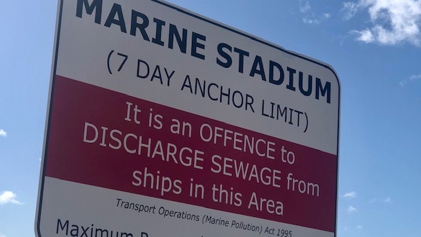 Signage at the Marine Stadium, known as Bum's Bay, at The Spit, warning about anchor limits.