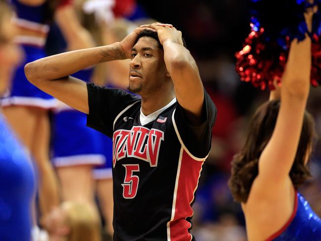 LAWRENCE, KS - JANUARY 04:  Christian Wood #5 of the UNLV Rebels walks off the court after the Kansas Jayhawks defeated the Rebels 76-61 to win the game at Allen Fieldhouse on January 4, 2015 in Lawrence, Kansas.  (Photo by Jamie Squire/Getty Images)