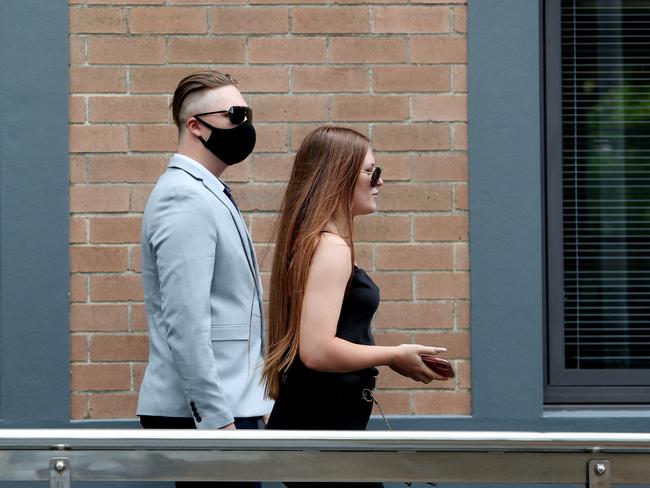 Wells (left) pictured leaving Wyong Local Court during a previous appearance. Photo: Sue Graham