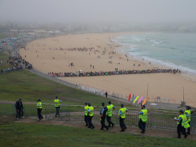 NSW police arrive to provide security at Sydney’s Bondi Beach during a visit by Harry and Meghan in 2018. Picture: Toby Zerna