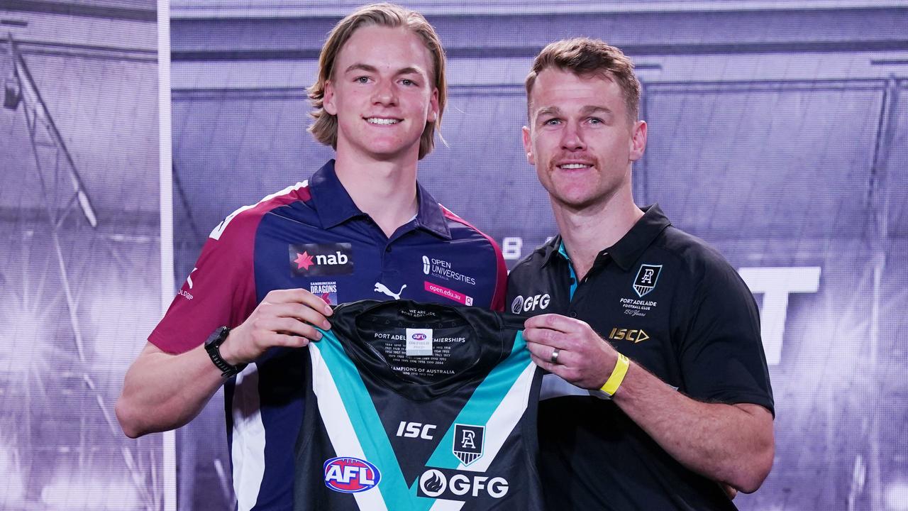 Robbie Gray presented Miles Bergman with his new jumper as part of Port’s team at the 2019 draft. Picture: Michael Dodge