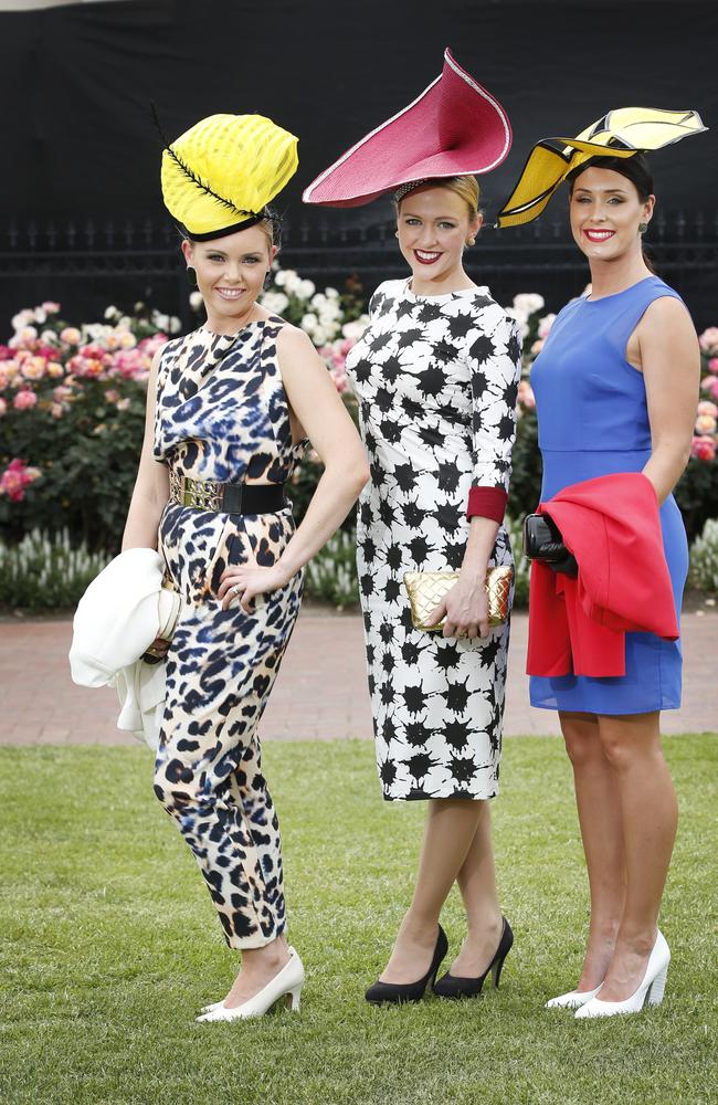 Chantelle Ford from the Block (centre) with friends Brooke Swain (left), and Lauren Delacca, all wearing Ford Millinery made by Chantelle. Picture: David Caird.