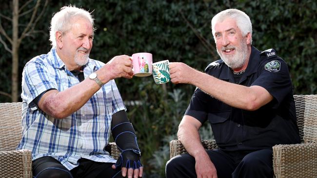 John Glatz with Sgt Joe McDonald at Glatz’s home in Woodside. Photo: Kelly Barnes