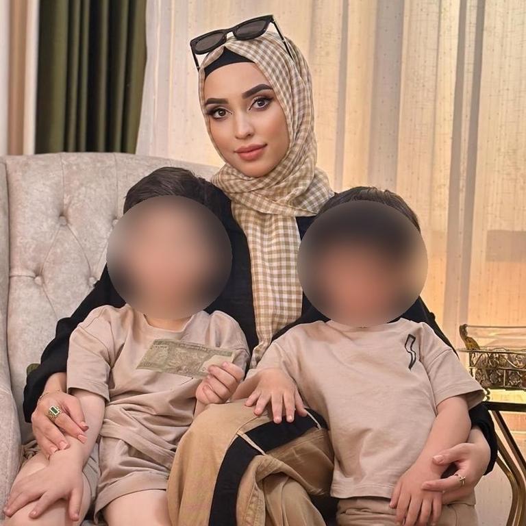 Muzhda Habibi, 23, with children