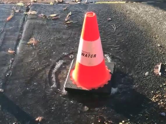 Video still from video posted by Roy Hawke to Sydney Water on Facebook: "With the state in drought and the govt contemplating turning the Desalination Plant on to secure our water supplies, what does it take for Sydney Water to repair leaking pipes?After walking past a leaking water pipe at the corner of Pittwater Rd and Hawkesbury Avenue in Dee Why for weeks, I took a video and sent a message to Sydney Water. They sent me back an email saying that the fault had been registered and would be attended to as soon as possible. One week later and now the water is gushing up through the footpath. I wonder what it will be like next week?Come on Sydney Water! Repairs are needed" Picture: Facebook